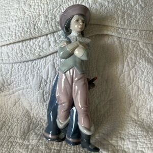 Lladro  “Musketeer Portos ” #6118, glossy porcelain